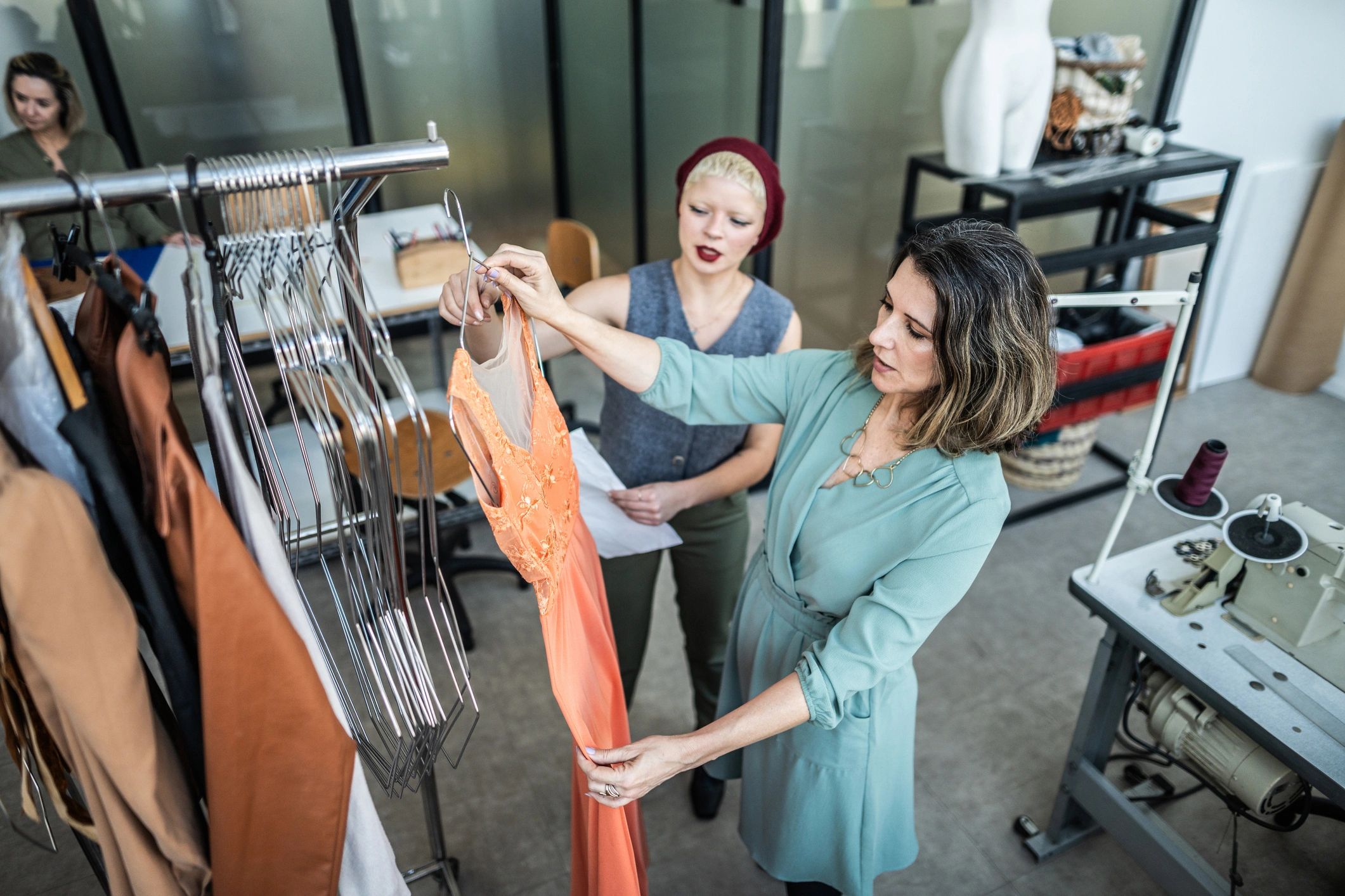 Tailors working together in an apparel atelier